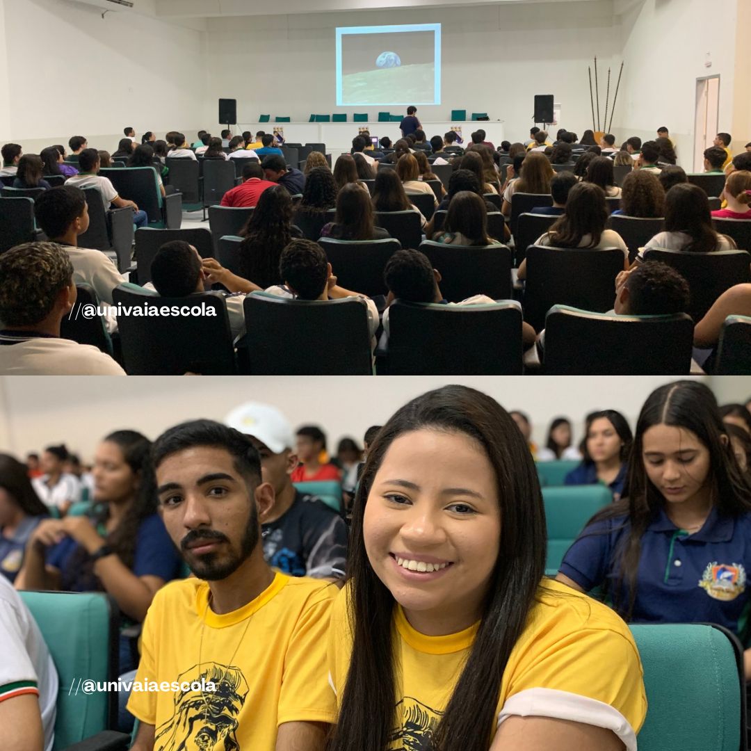 Auditório lotado com pessoas reunidas para assistir a palestra